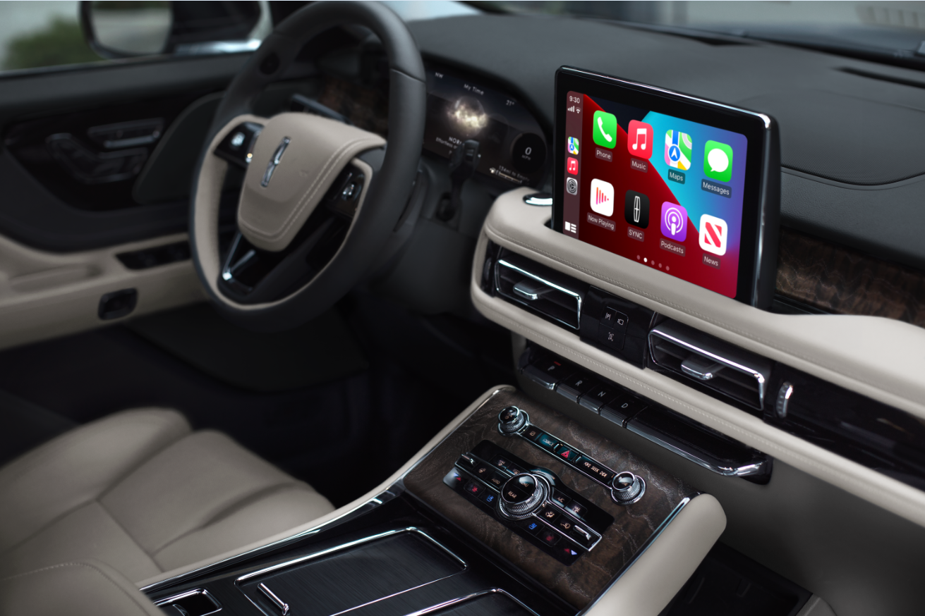 The interior of a Lincoln Aviator® SUV is shown with emphasis on the center touchscreen | Karl Malone Lincoln in El Dorado AR